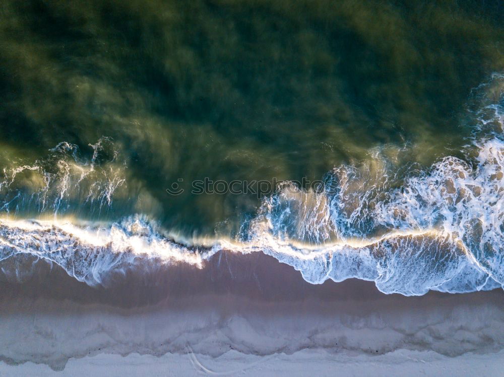 Similar – Aerial View From Flying Drone Of Ocean Waves On Beach