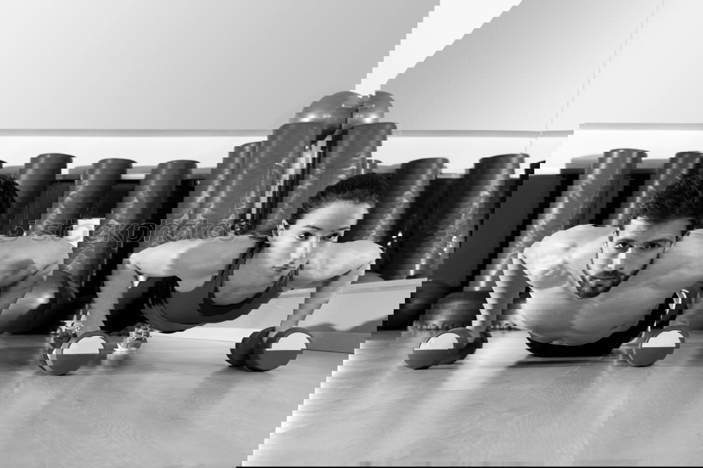 Similar – Image, Stock Photo Man doing push ups in fitness class