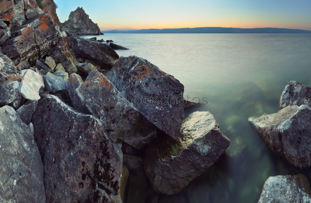 Similar – White rock, black sand