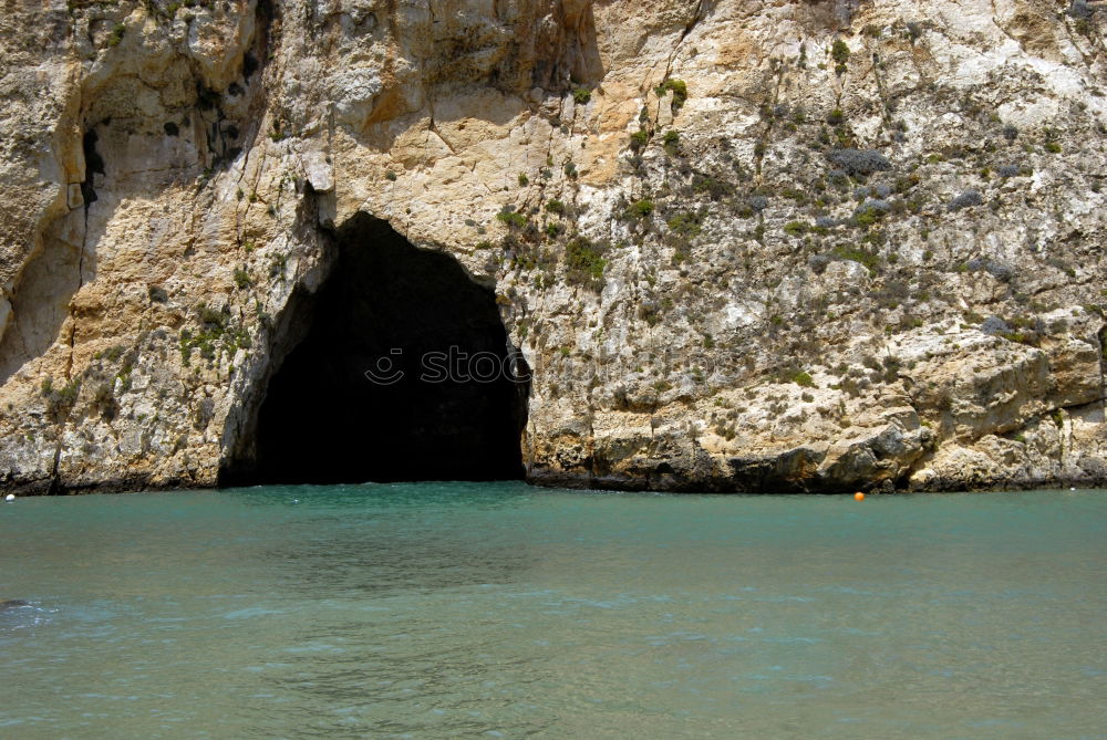 Similar – Urlaub und Erholung. Meer und Felsen. Blick vom Wasser. Idylle