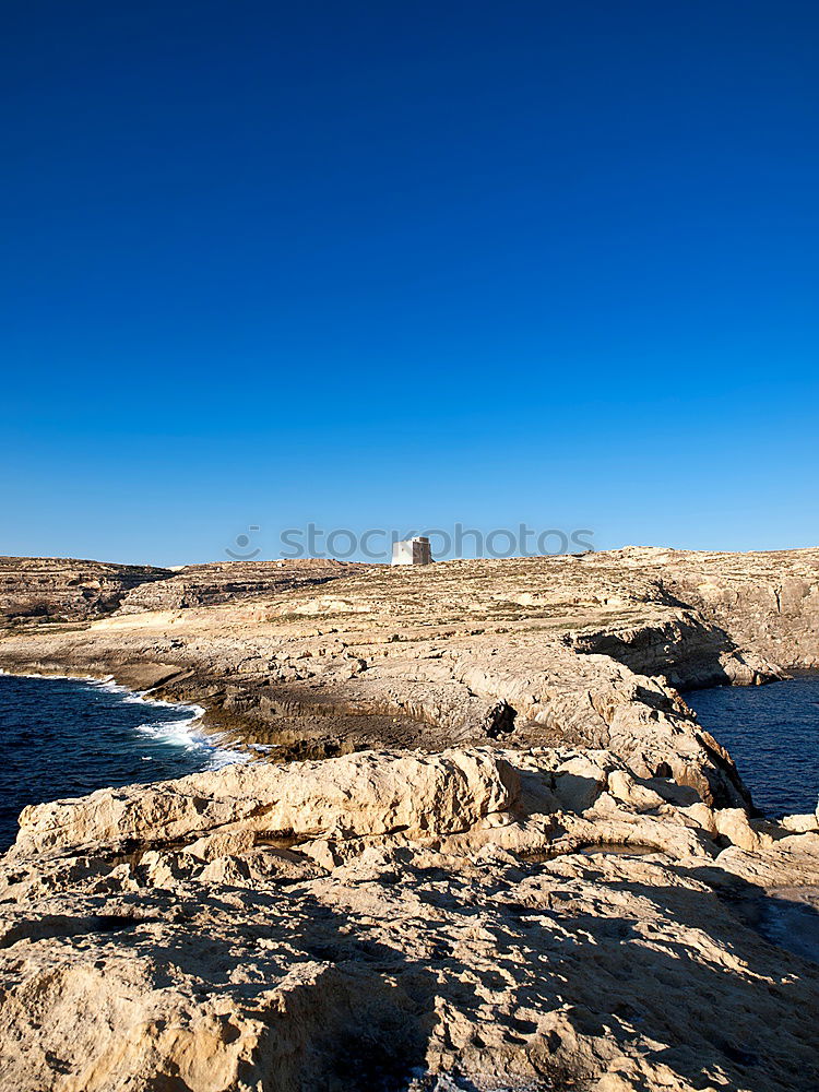Image, Stock Photo Lighthouse at Cabo Carvoeiro with rugged rocks
