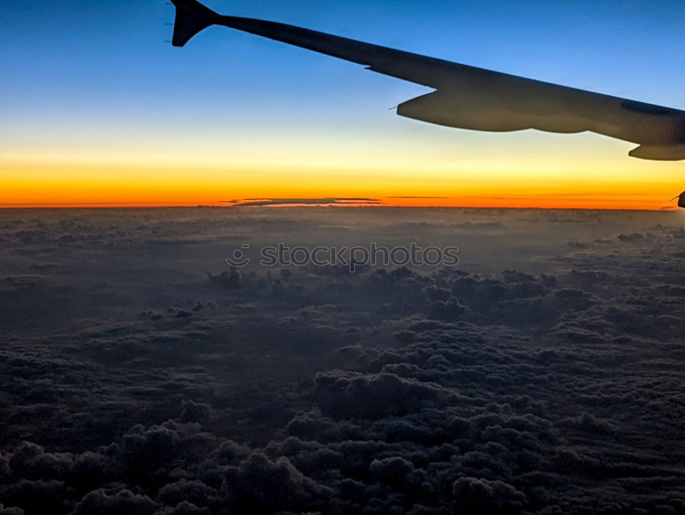 Similar – clouded view Wing Airplane