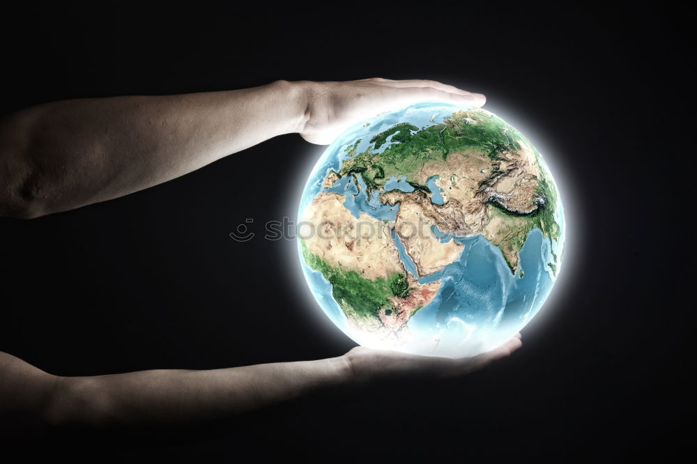 Similar – Woman holding a globe in her hand