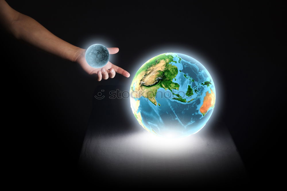 Similar – Woman holding a globe in her hand