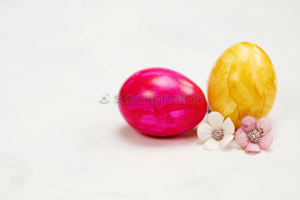 Similar – Image, Stock Photo Two white Easter eggs with red dots in the straw