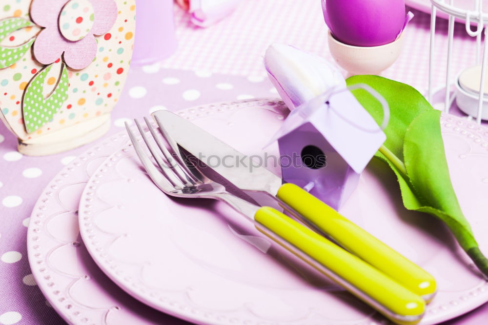 Similar – Disposable colorful plastic dish, straws and cups, cutlery. Flat lay on pink background.