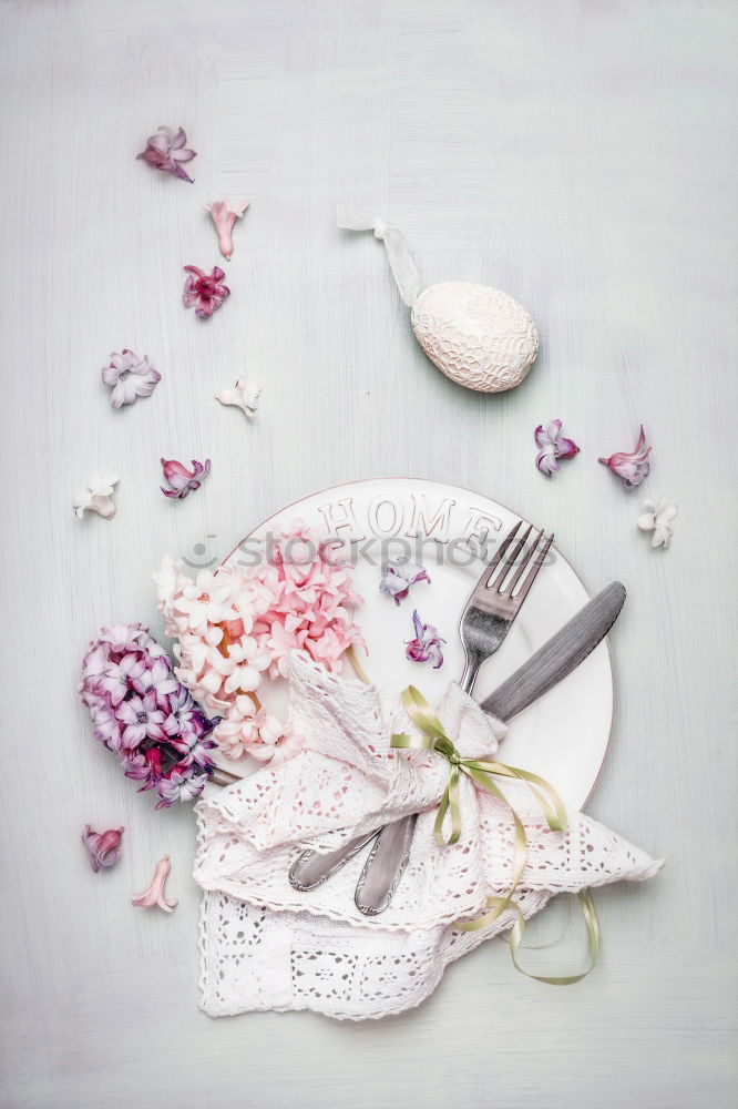 Similar – Easter table setting with flowers, decor egg and cutlery