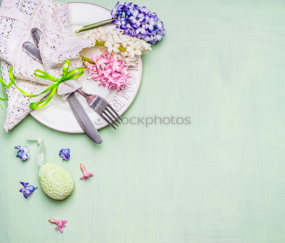 Similar – Easter table setting with flowers, decor egg and cutlery