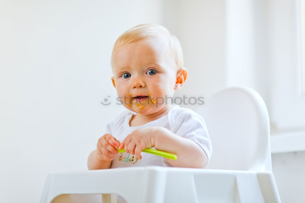 Similar – Image, Stock Photo Baby eats alone. Eating