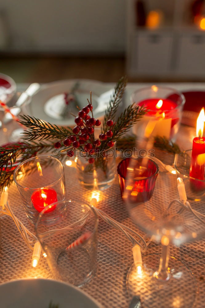 Similar – Christmas table set with biscuits and candles