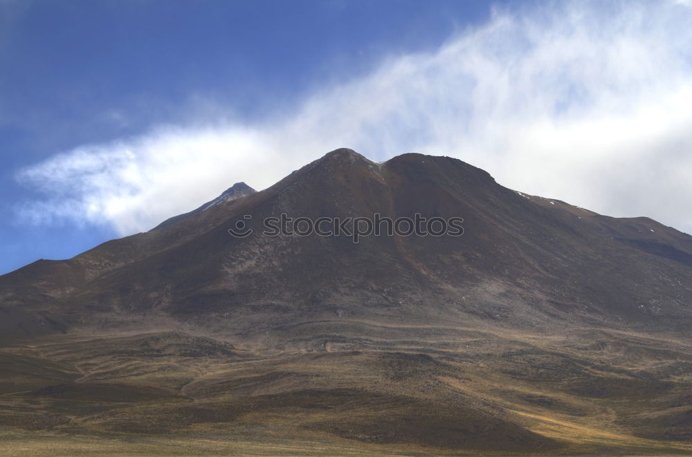 Similar – Wild horses in front of the Cotopaxi volcano in Ecuador