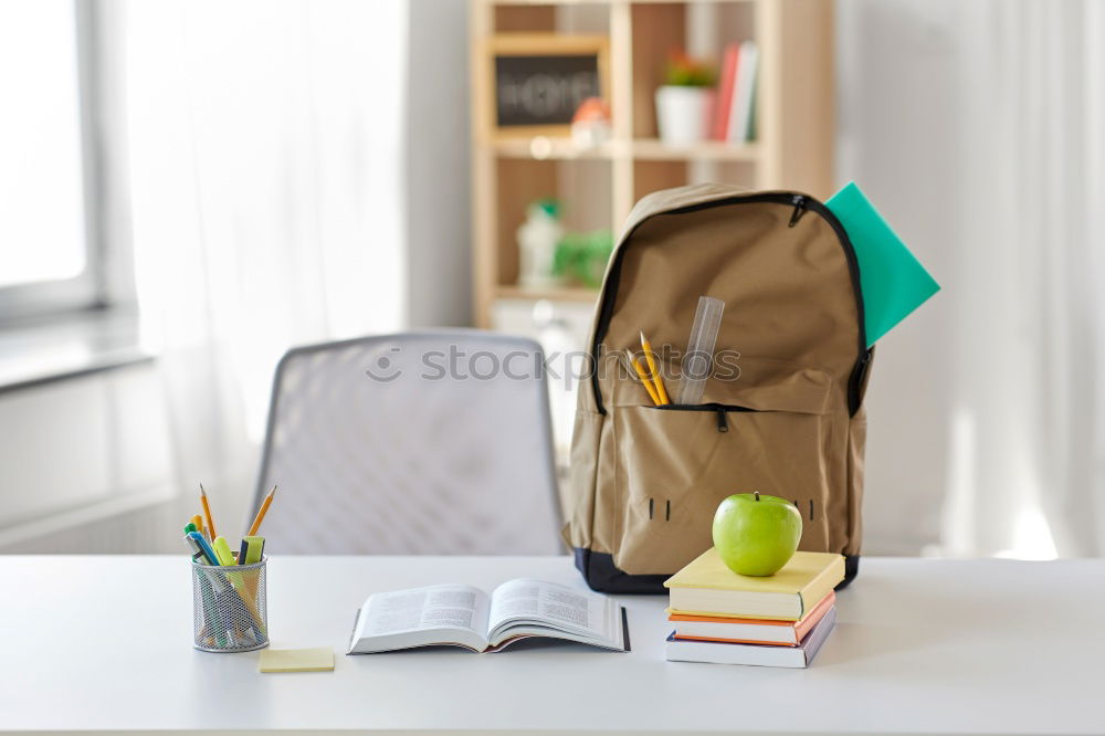 Similar – Image, Stock Photo Backpack and school supplies: books, magnifying glass, notepad