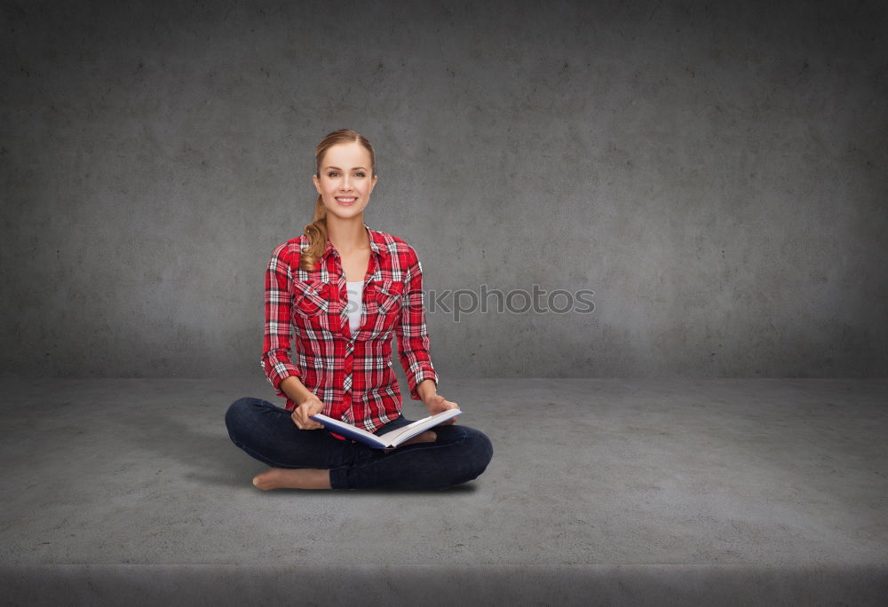 Similar – Woman sitting with one leg on chair