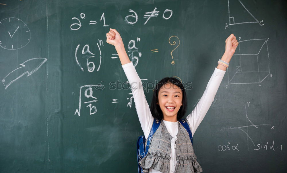 Similar – Happy schoolgirl with hand up