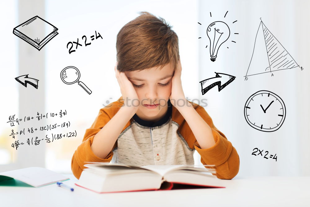 Similar – Young boy thinking about his homework