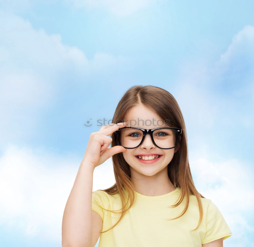 Similar – smiling baby with an orange on blue background