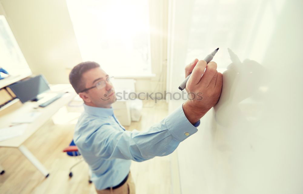 Similar – Image, Stock Photo Architect or planner working on drawings for construction