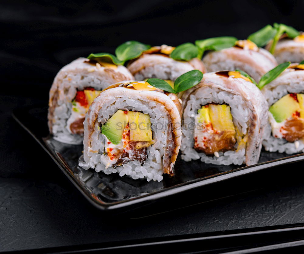 Similar – sushi assortment in white plate and soya sauce