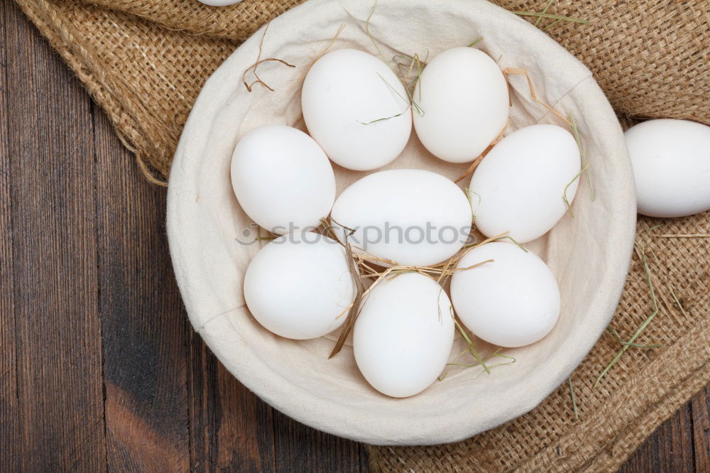 Similar – Image, Stock Photo Fresh eggs in a cardbox tray.