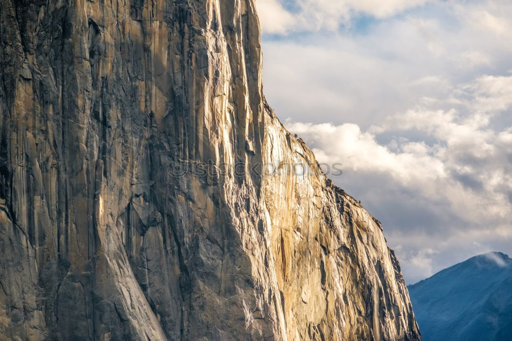 Similar – Rock climbing team bivouaced in a storm.