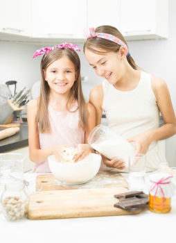 Similar – Image, Stock Photo Little sisters girl preparing baking cookies.