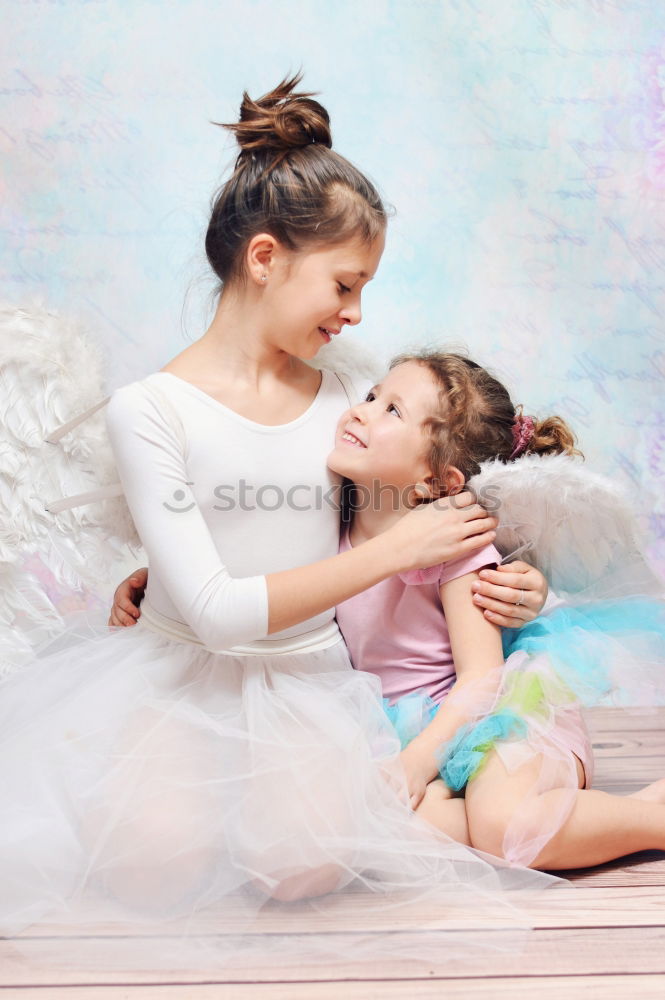 Similar – Image, Stock Photo Two beautiful sister kids playing under white sheets