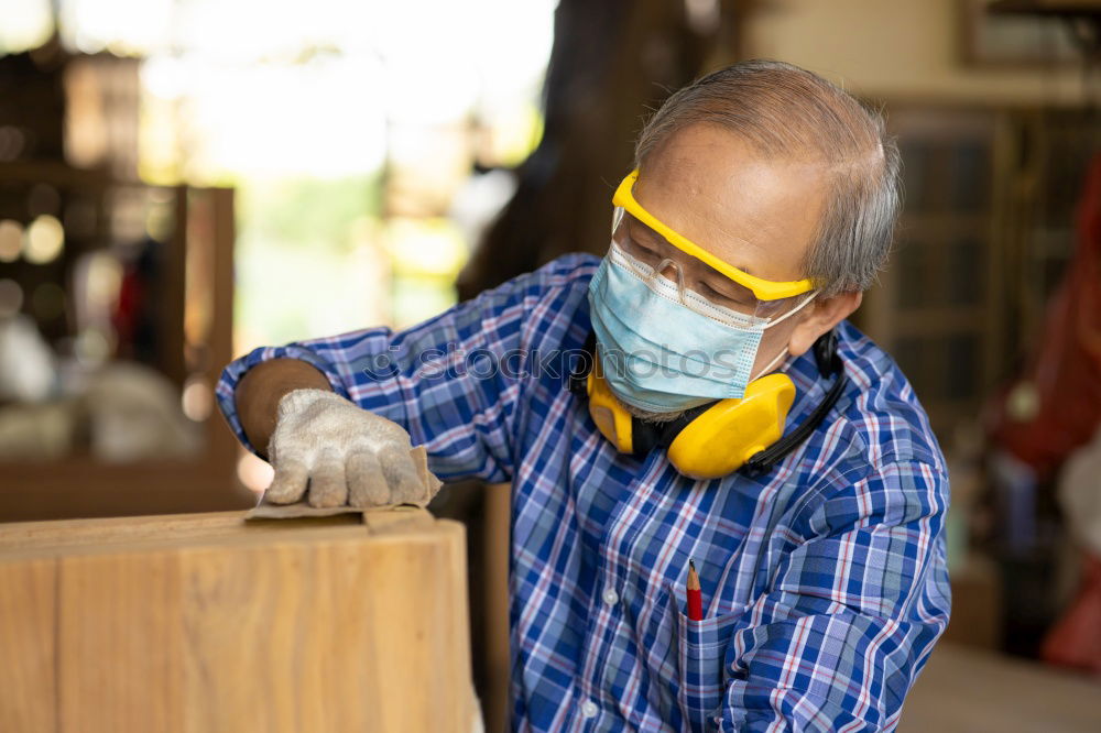 Similar – Professional carpenter at work.