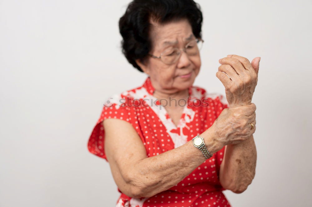 Image, Stock Photo Senior lady chatting to a younger woman smiling as they enjoy a few relaxing moments together in the living room