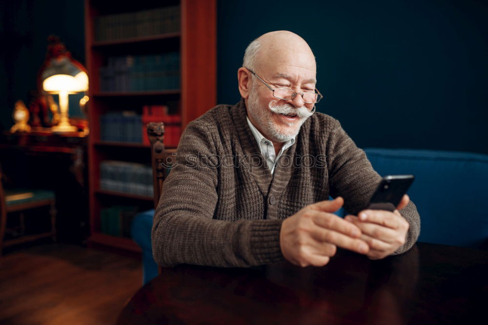 Similar – Image, Stock Photo Senior citizen with smartphone in the woods