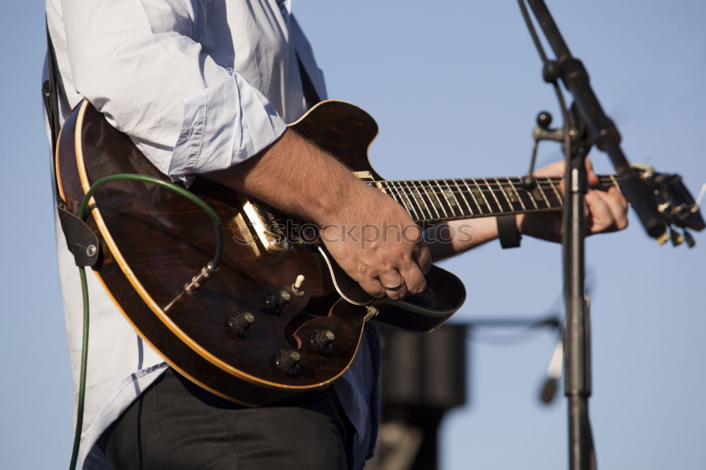 Similar – Image, Stock Photo outdoor photo session with a bass player and his instruments