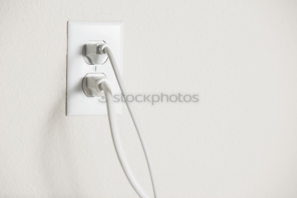 Foto Bild Stecker in der Steckdose