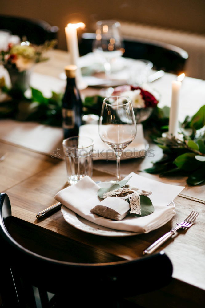 Similar – Group of People enjoying food and wine at restaurant