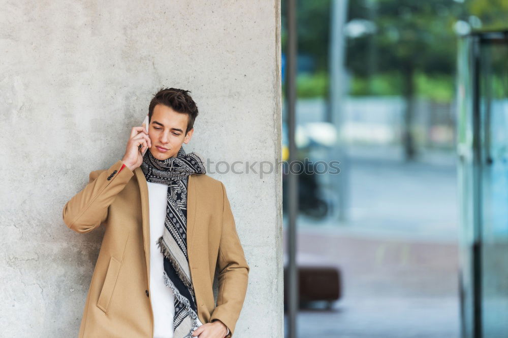 Image, Stock Photo Modern young man with mobile phone in the street.