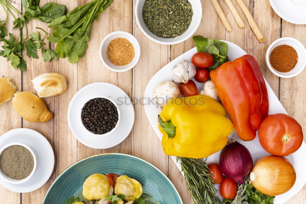 Similar – Couscous with vegetable ingredients in bowls