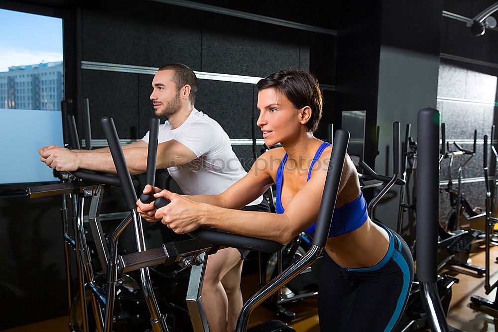 Similar – Image, Stock Photo Couple in a spinning class wearing sportswear.