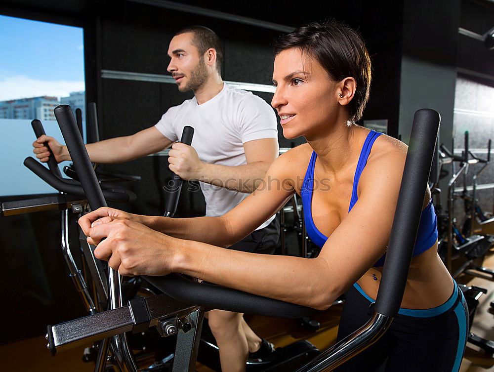 Similar – Image, Stock Photo Couple in a spinning class wearing sportswear.