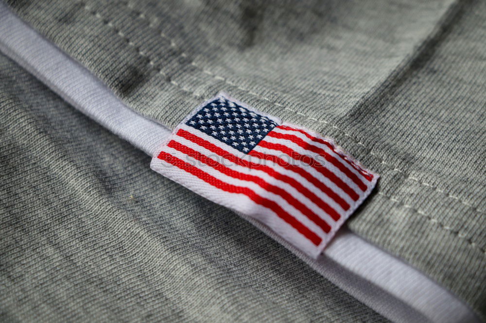 Similar – Image, Stock Photo Happy Independence day July 4th. American flag textile patch on a denim jacket and American pin