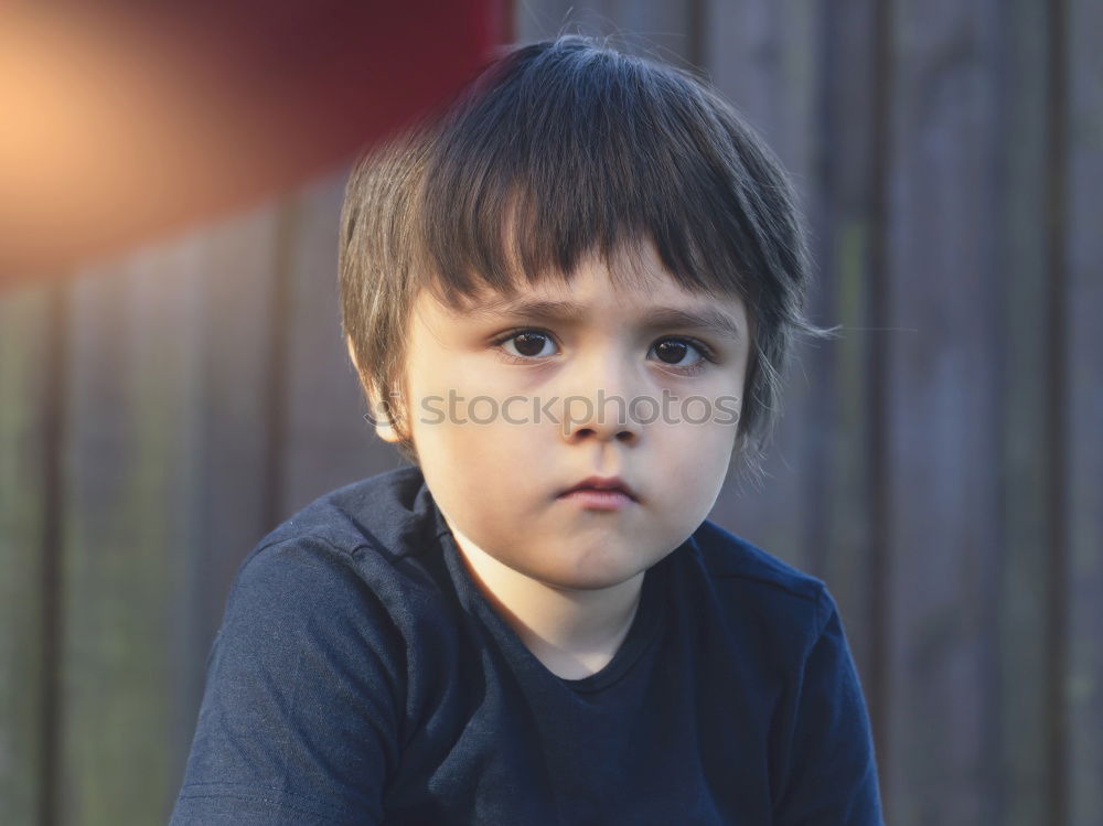 Similar – cute sad child boy portrait