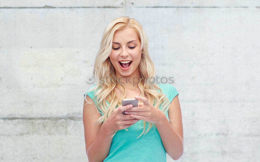 Similar – young woman with phone outdoors