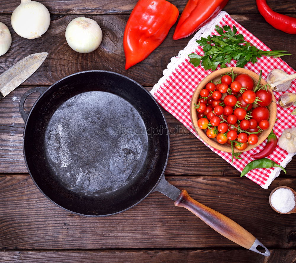 Similar – empty black cast-iron frying pan