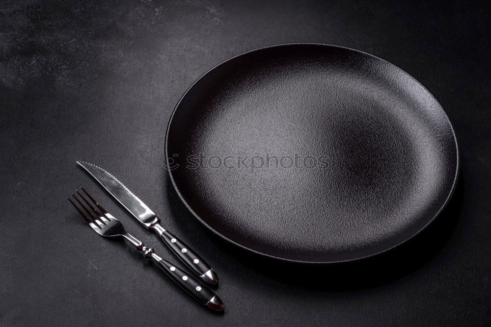 Similar – Black frying pan among the fresh vegetables