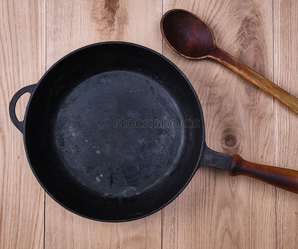 Similar – black round cast iron pan