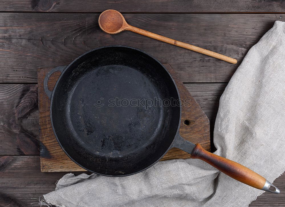 Similar – Empty black cast-iron frying pan