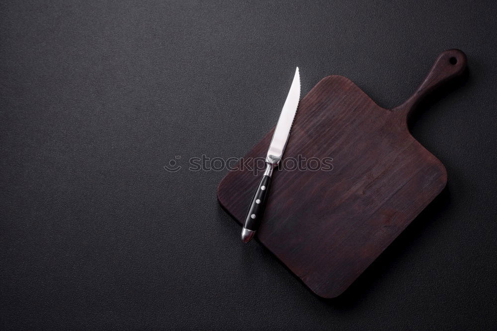 Similar – wooden cutting board and old knife