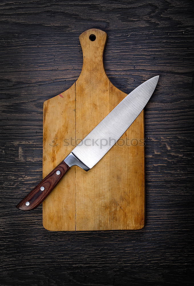 Similar – knife with sharpening on the table