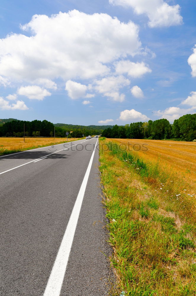 Similar – man with an e-bike looks at a road map