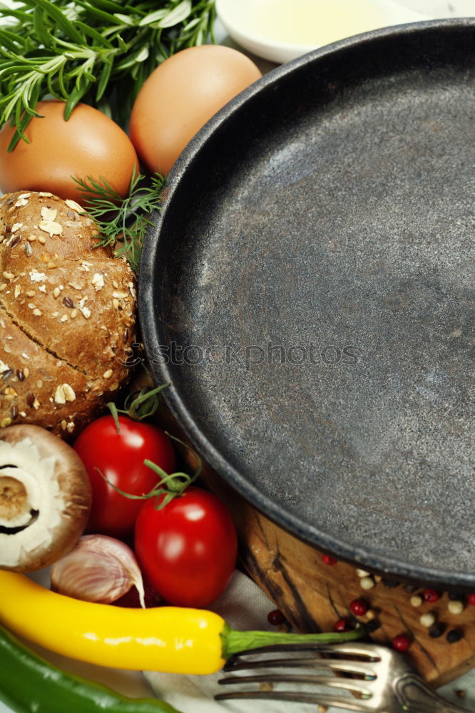 Similar – empty round black frying pan, top view