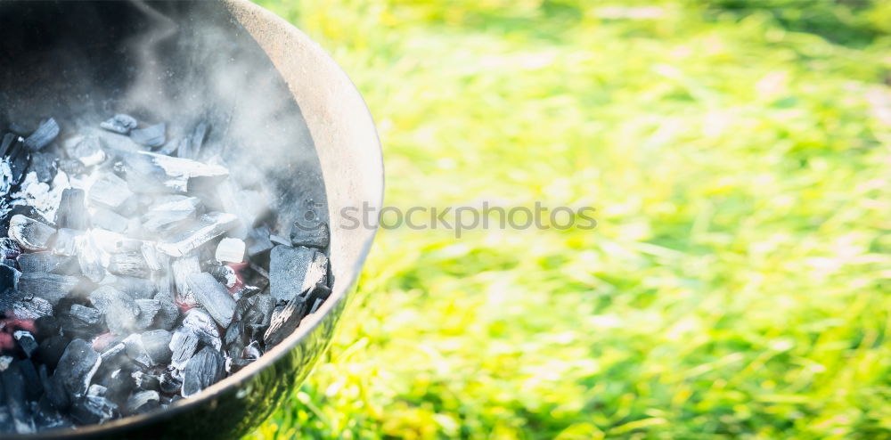 Similar – Hot coals with smoke in grill