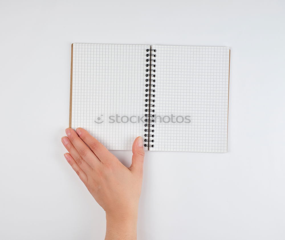 Image, Stock Photo empty open notebook in a cell and a female hand