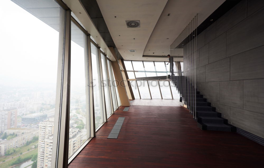 Similar – View out of the window of a high-rise building on the area around Frankfurt’s railway station